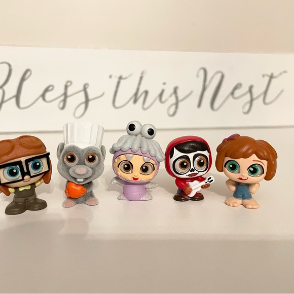 FREE w/purchase Pixar doorables | Young Carl & Ellie , Remy , Boo , Miguel - Picture 2 of 5